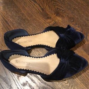 Restricted Velvet Flats
